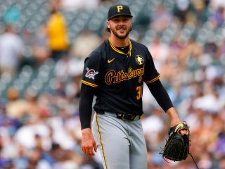 DENVER, CO - AUGUST 2: Starting pitcher Paul Skenes #30 of the Pittsburgh Pirates smiles as he walks off the field in the fourth inning against the Colorado Rockies at Coors Field on August 2, 2025 in Denver, Colorado. (Photo by Justin Edmonds/Getty Images)